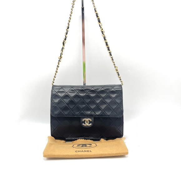 CHANEL Handbags - CHANEL Vintage Black Leather Shoulder Bag With Gold Hardwear
